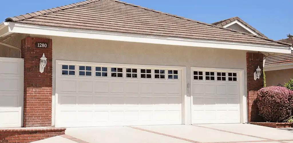 Residential garage door repair service for a double garage door in Philadelphia, PA