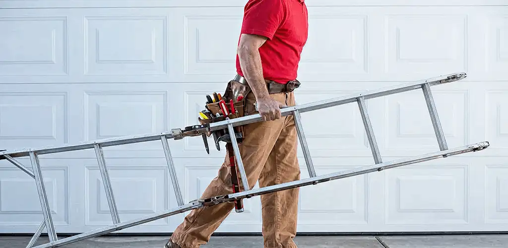 Garage door repair technician arriving with tools and ladder in Philadelphia, PA