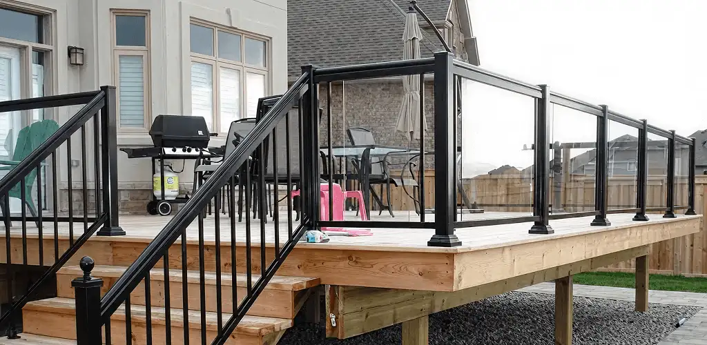 Handrail installation on a deck staircase for safety and code compliance in Philadelphia, PA